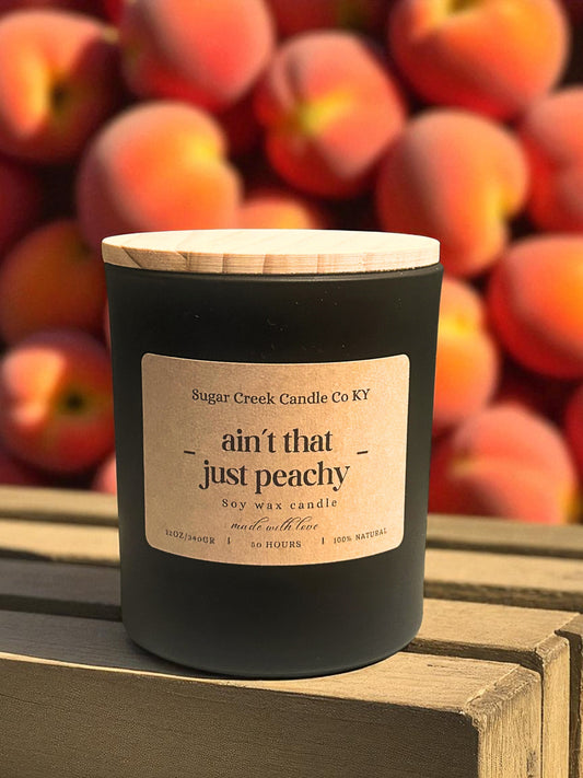 Ain't That Just Peachy - soy wax candle, amaretto, lime, papaya, peach, mango and tonka bean